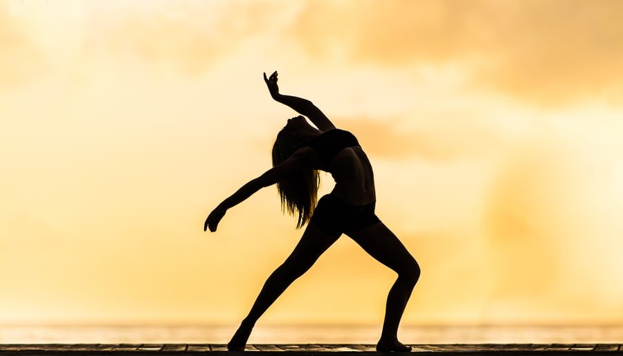 Woman stretching on beach